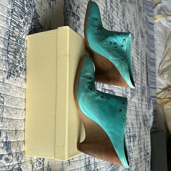 Cowboy wedge slides in the season’s hot turquoise color. 3” heel leather uppers - Picture 2 of 3